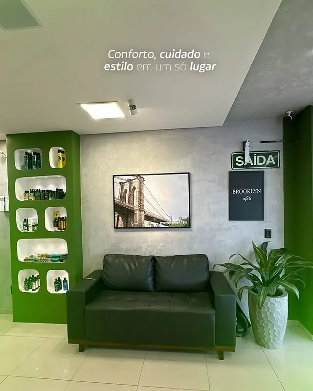 Vista geral do ambiente premium da barbearia